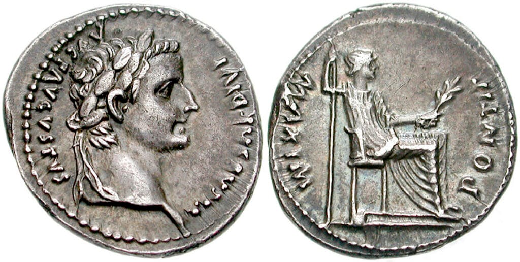 Denario de plata de Tiberio acuñado en Lyon: busto laureado en anverso y figura sedente en reverso.