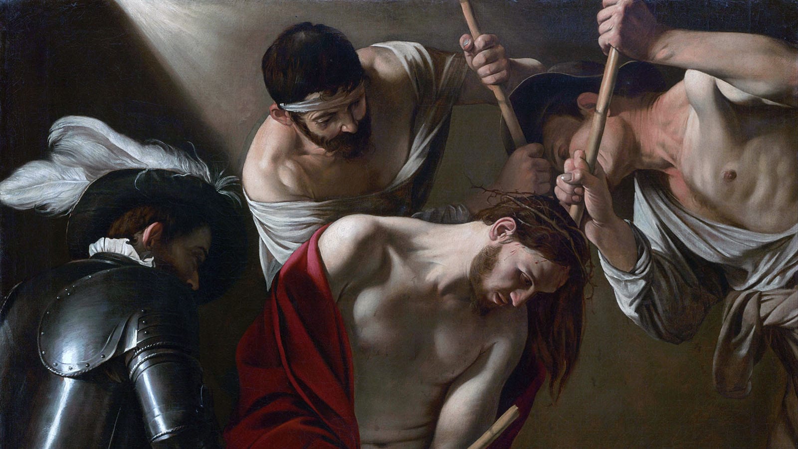 Cristo coronado de espinas en una pintura de Caravaggio sobre la burla de los soldados.