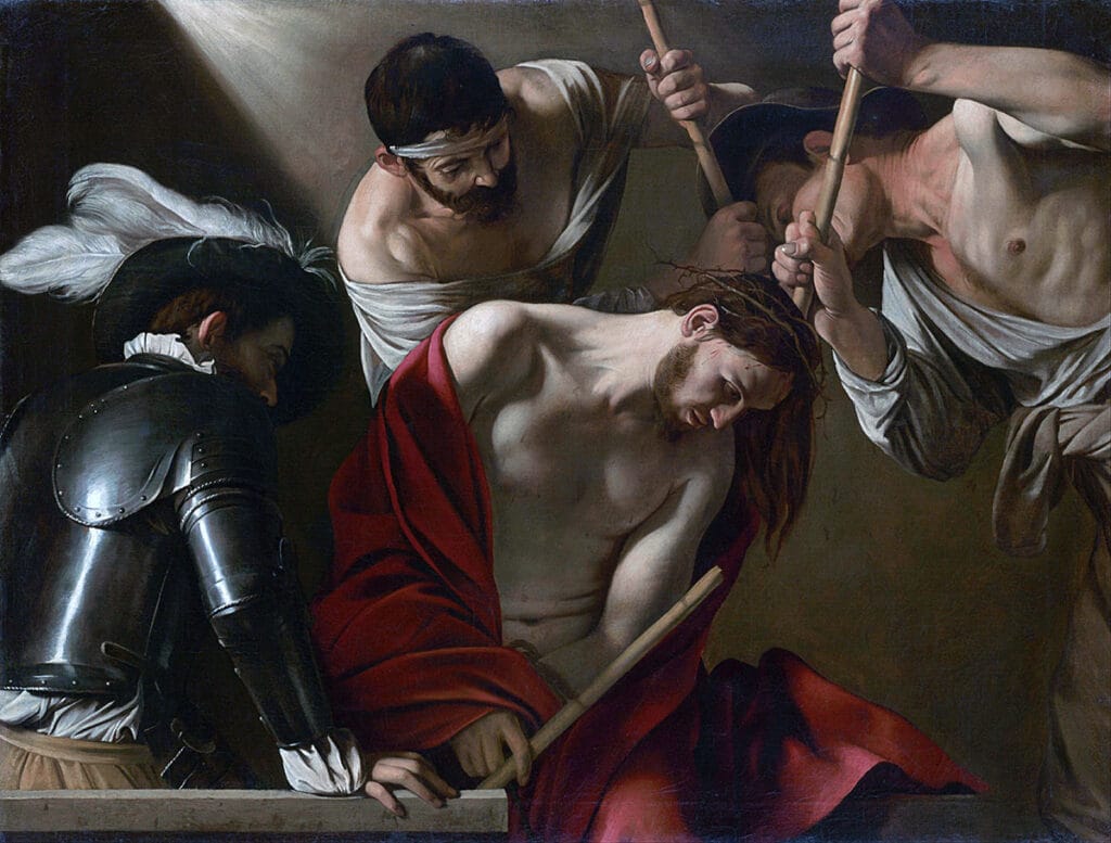 Cristo coronado de espinas en una pintura de Caravaggio sobre la burla de los soldados.